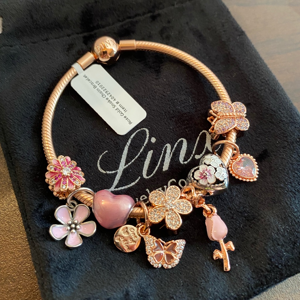 Linx Rose Gold Bracelet With Pink And Rose Gold Themed Charms